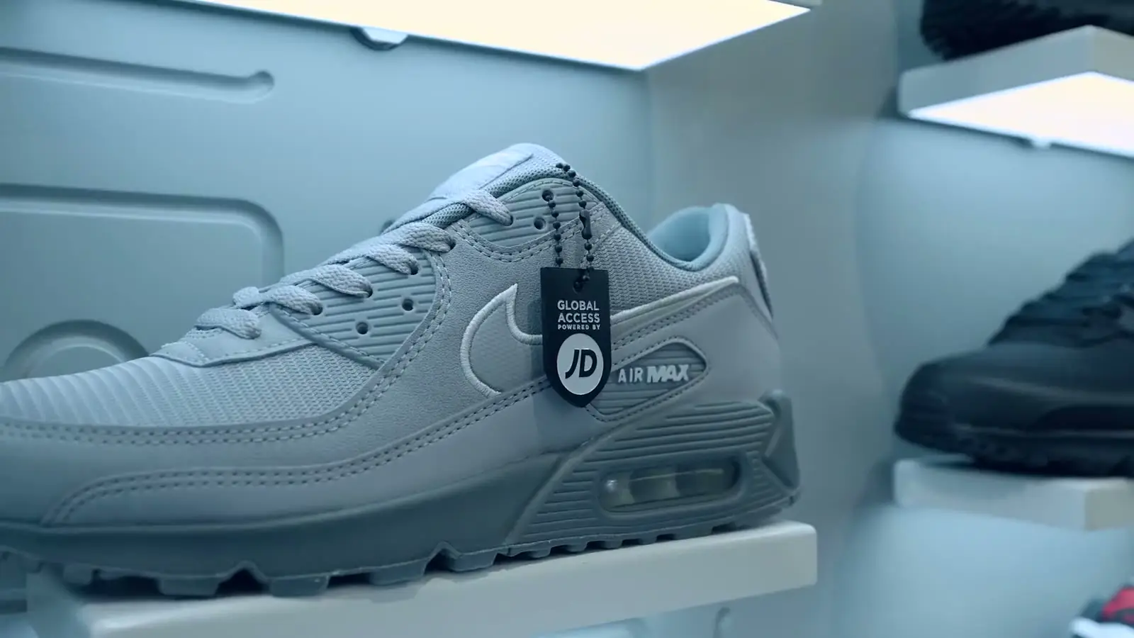 A Nike Air Max on the JD Sports wall