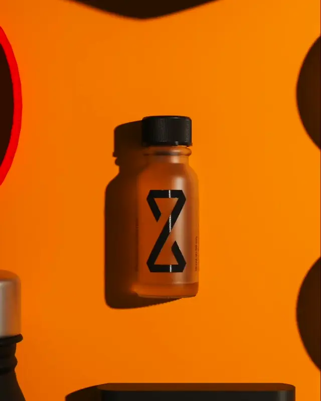 A ZBiotics bottle on an orange set